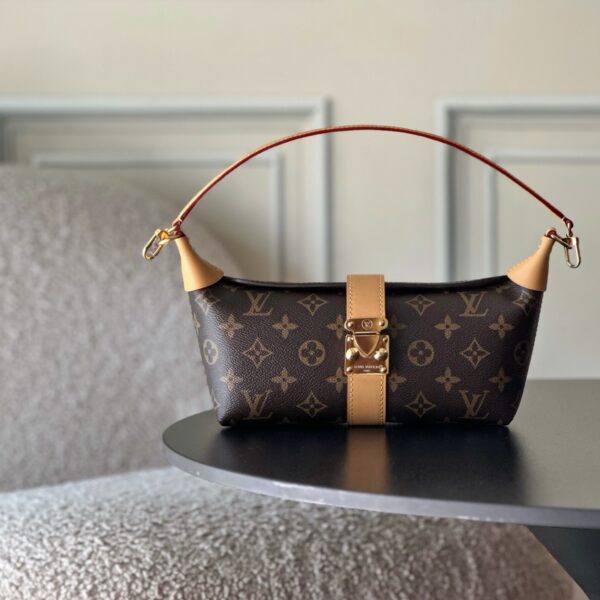 Bolsa Pochette Mia em canvas Monogram 1