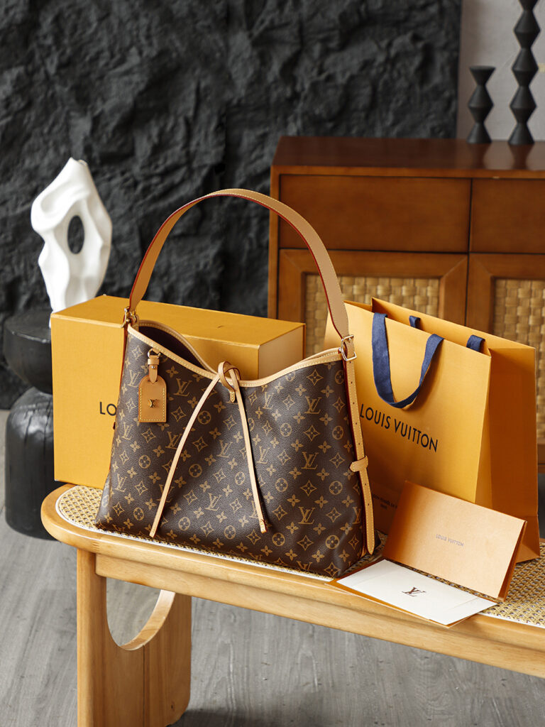 Bolsa CarryAll MM em canvas Monogram 10