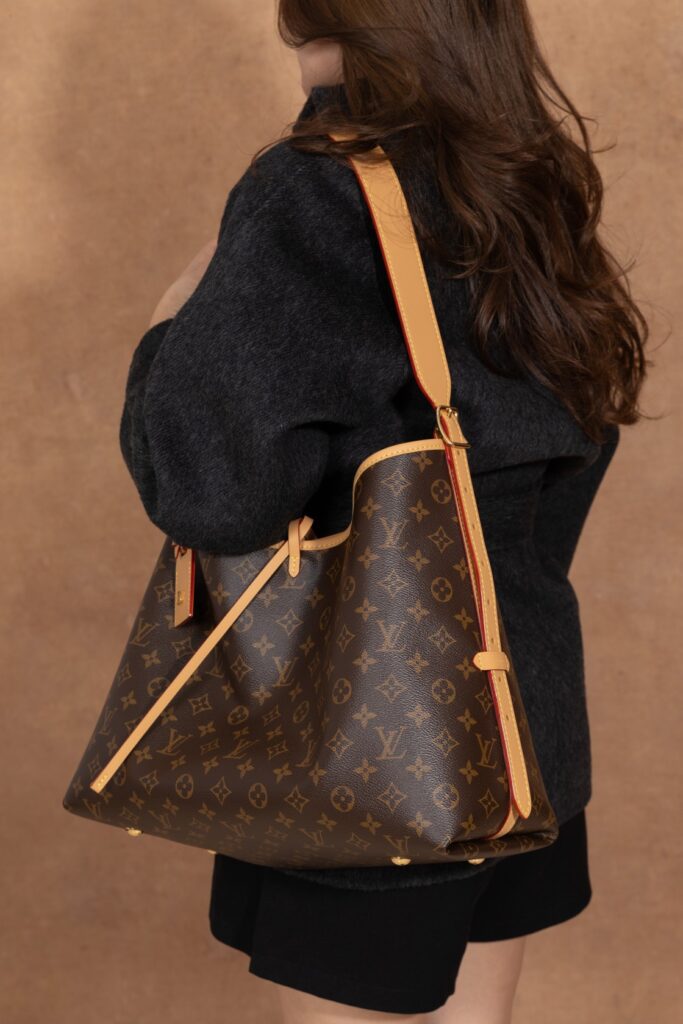 Bolsa CarryAll MM em canvas Monogram 12