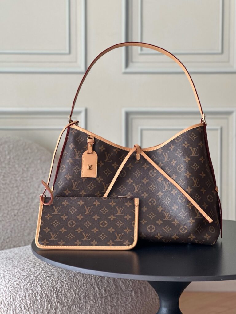 Bolsa CarryAll MM em canvas Monogram 16