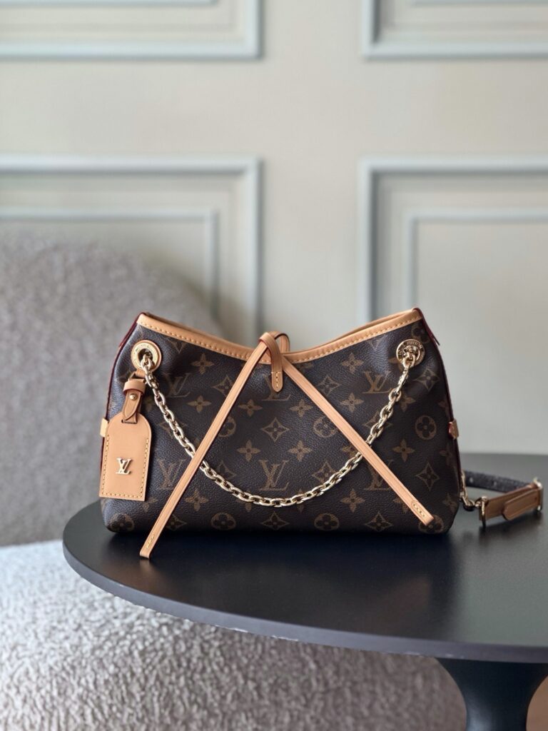 Bolsa CarryAll BB em canvas Monogram 19