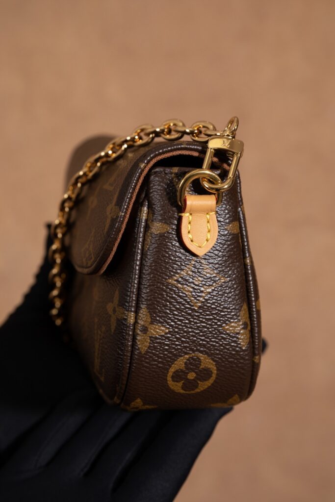 Bolsa Wallet on Chain Ivy em canvas Monogram 25