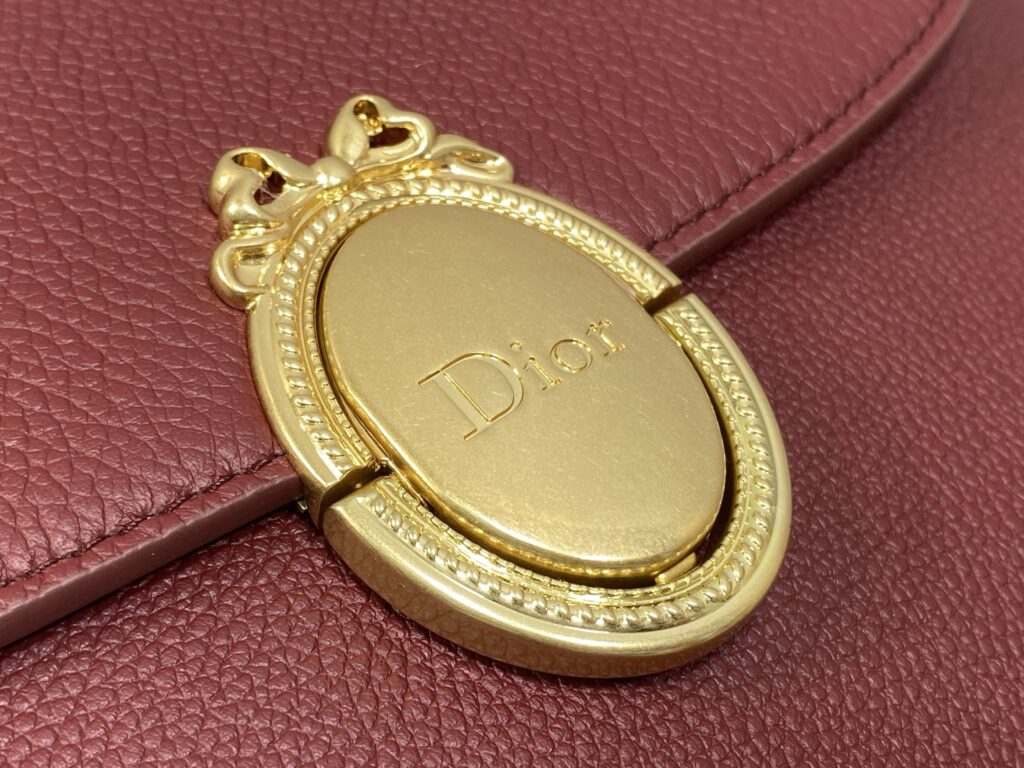 Bolsa Dior Saddle com ferragens douradas vintage 57
