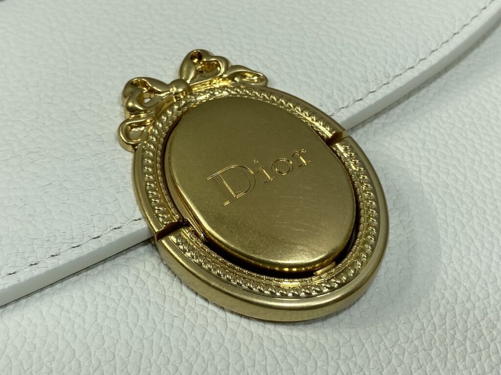 Bolsa Dior Saddle com ferragens douradas vintage 75