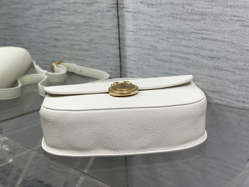 Bolsa Dior Saddle com ferragens douradas vintage 80
